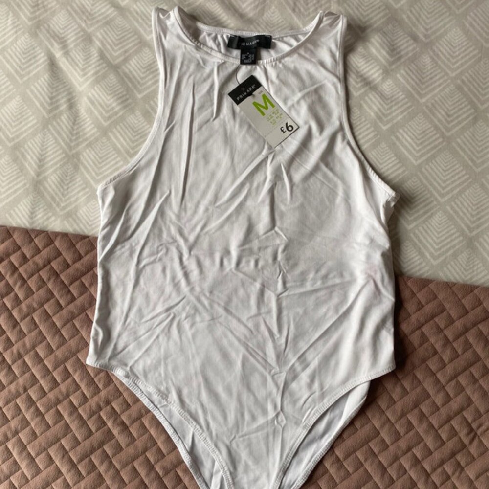 White bodysuit.